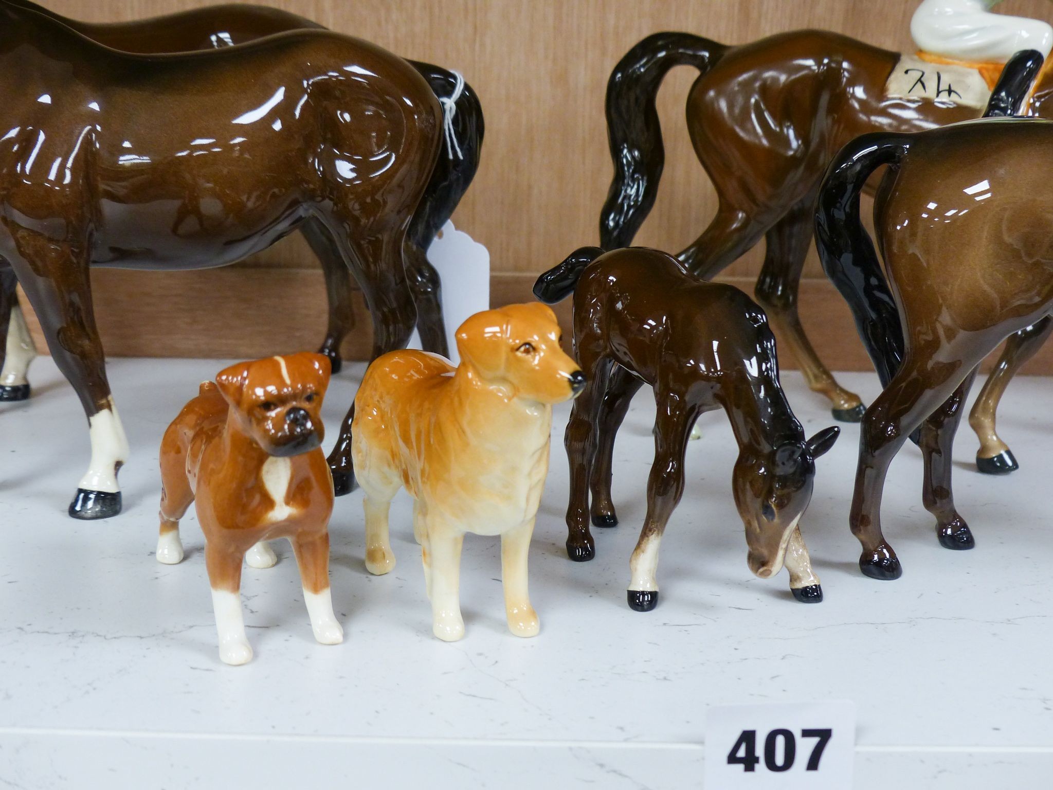 Five Beswick horses and two Beswick dogs, tallest 21.5 cm